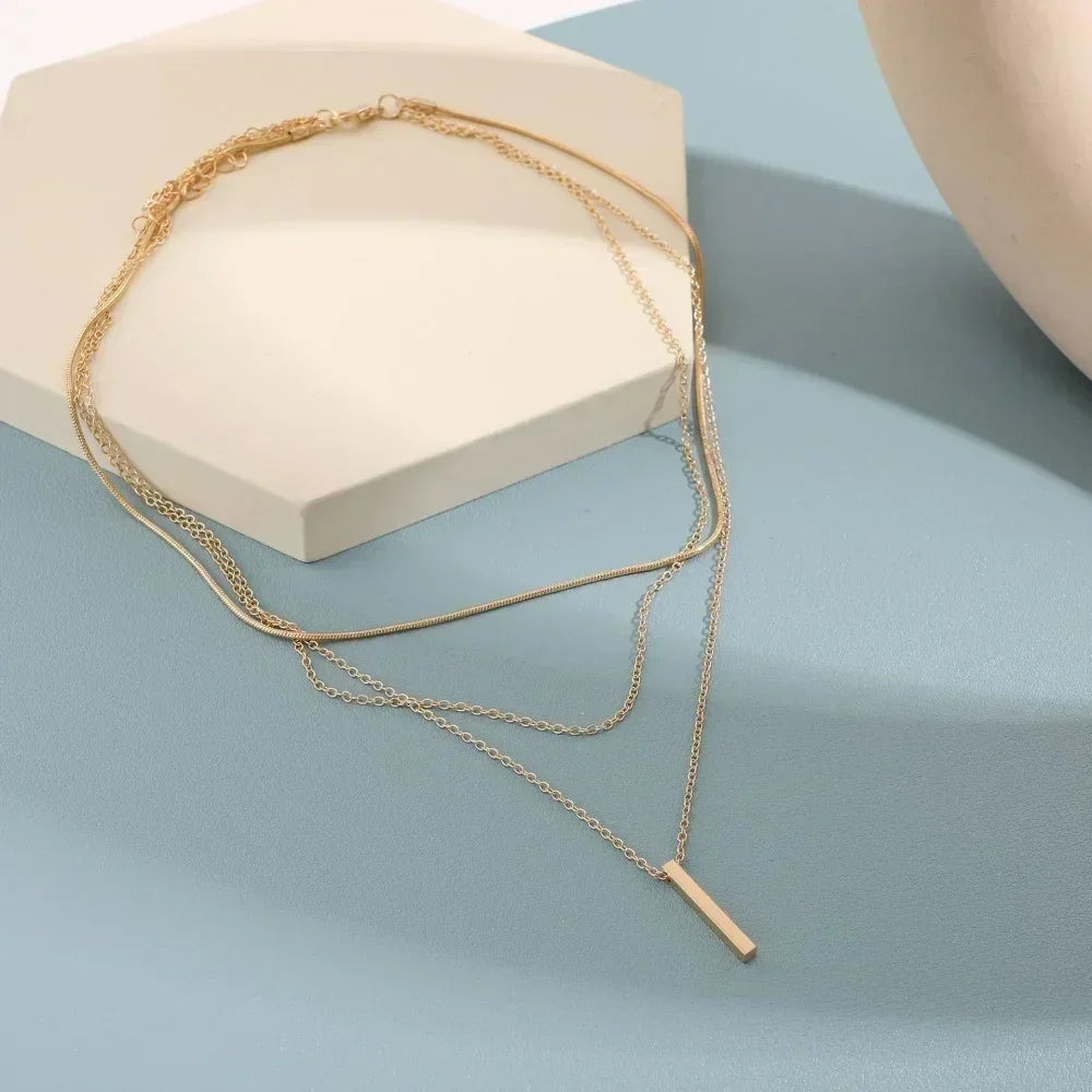 Three-Piece Gold Star, Pearl and Cross Necklace Set