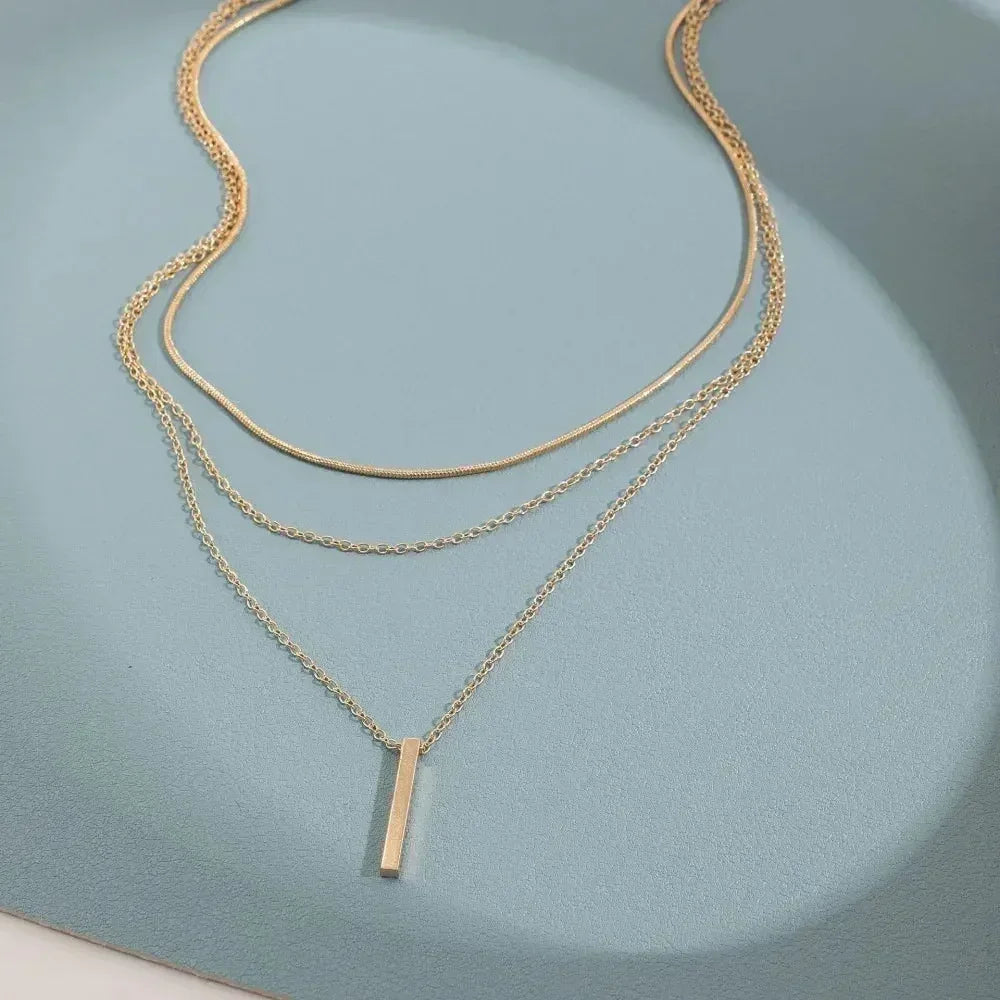 Three-Piece Gold Star, Pearl and Cross Necklace Set