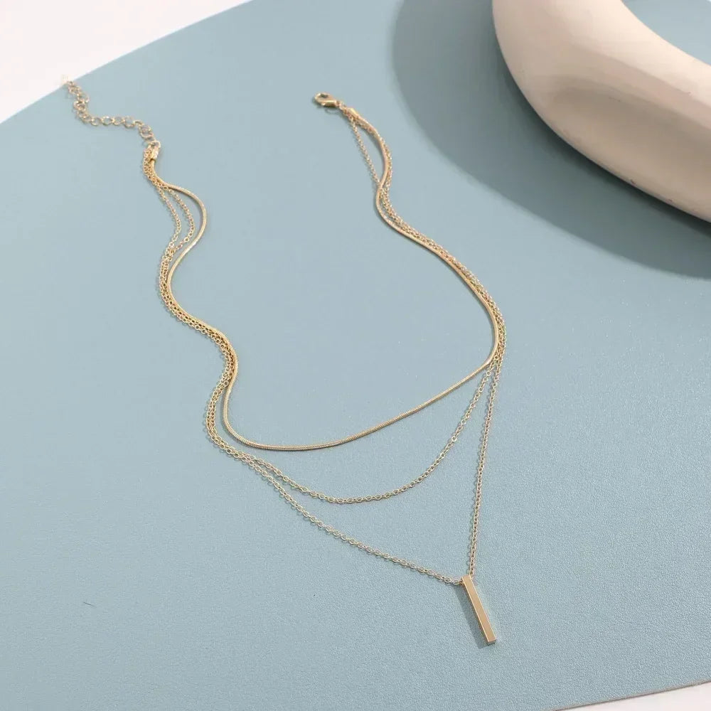 Three-Piece Gold Star, Pearl and Cross Necklace Set